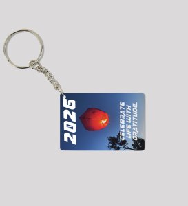 Glowing Red Sky Lantern Floating Above Trees Encouraging Celebration and Gratitude in 2026 Printed Keychain Pack of 2.